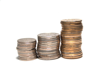 Three stacks of coins loking like bar-graph