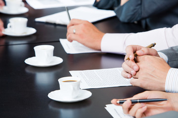 Image of businesspeople’s hands