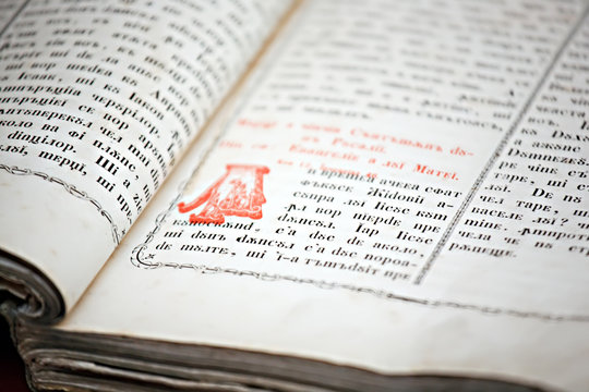 old cyrillic writings closeup on religious book
