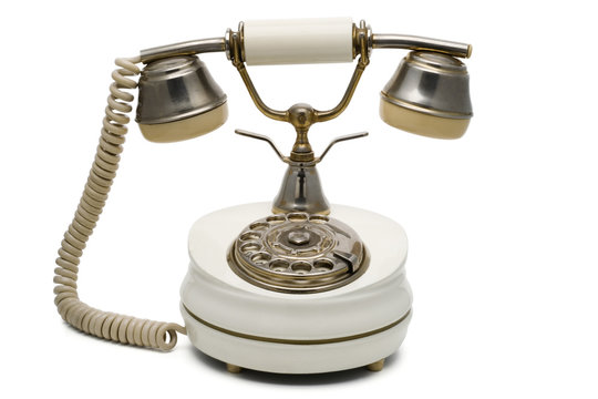 a vintage white telephone on white with clipping path