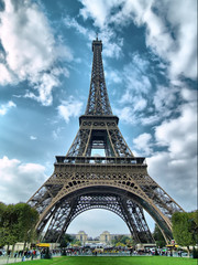 Eiffel tower against a sky background.
