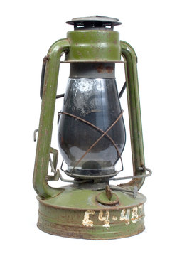 Antique green gasoline glass lamp isolated on white