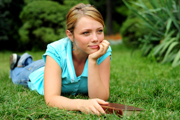 Student Reading in a public park