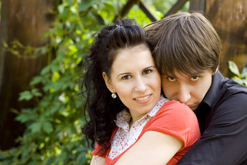 Fototapeta premium outdoor portrait of young happy attractive couple together