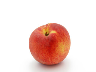 Ripe peach on a white background