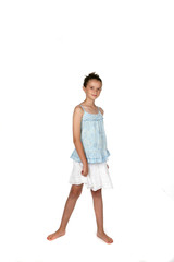 pretty young girl with hair pulled back in blue shirt