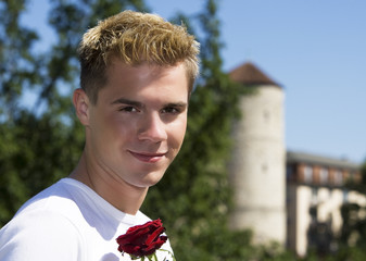 young man with rose