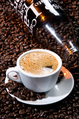 Coffee beans on a black glass