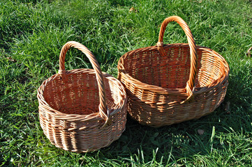 Fototapeta na wymiar Empty baskets on a grass