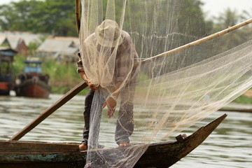 Pêcheur dans le delta du Mékong