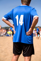 football on the sand, focus point on center of photo