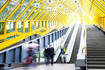 Mooving escalators and stairs, bridge with spheres