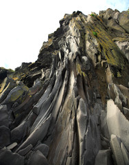 Basalt rock face Arnarstapi beach Iceland.