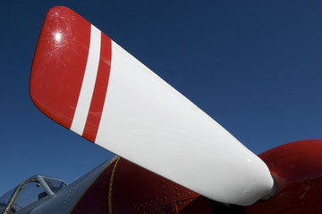 Red and white aircraft propeller