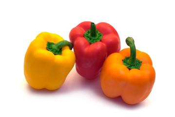 A red,orange and yellow pepper shot on a white background