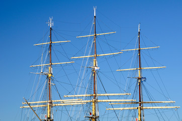 Detail of tall ship at the harbour. The mast of a tall ship.