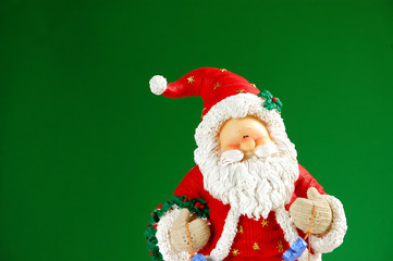Santa against green background