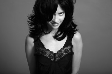 Fototapeta premium Fashion portrait of young attractive lady. Black and white photo