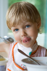 beautiful little girl during a meal
