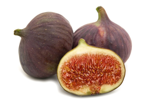 three figs on white background