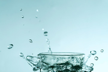 super splash in glass on white background