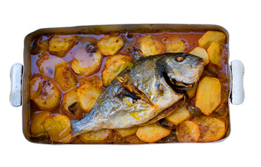 gilthead bream fish roasted in a tray