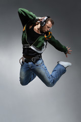 cool looking dancer makes a difficult jump