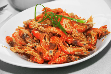 deep fried crispy shrimp served in a dish.