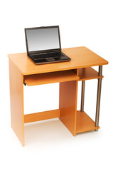 Laptop and desk isolated on the white