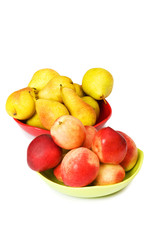 Fototapeta na wymiar Plates with peaches and nectarines on the white