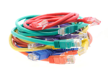 Stack of colorful network cables in isolated white background