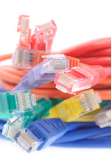 Close up of multi color network cables over white