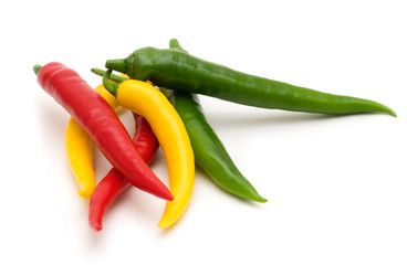 colorful peppers on white background