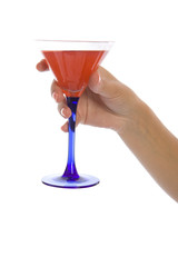 Woman hand hold wineglass with sweet cocktail