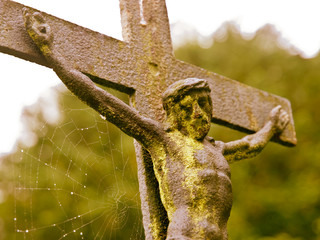 crucifix detail on the old Salzburg Cemetery, Austria