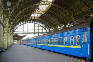 Obraz na płótnie Canvas Railway station with long-distance train