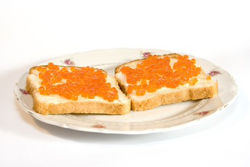 Two sandwiches with salmon caviar
