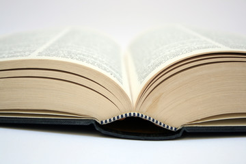 an isolated open old book