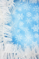 White garland on snowflake background, Christmas background