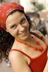 outdoor portrait of happy woman in red