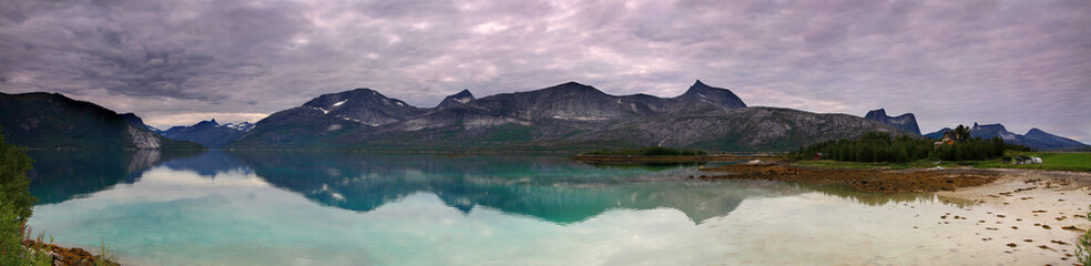 Norway landscape panorama, fjord and mountains in the background