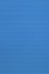 Blue corrugated color paper background
