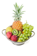 Fresh tropical fruits isolated on a white background