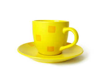 Yellow ceramic cup of coffee isolated on a white background