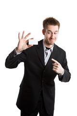 A caucasian businessman showing his business card