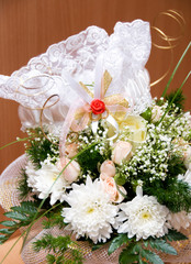 white garter on the wedding bouquet