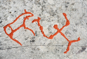 ancient rock carvings (petroglyphs) in Alta, Norway - obrazy, fototapety, plakaty