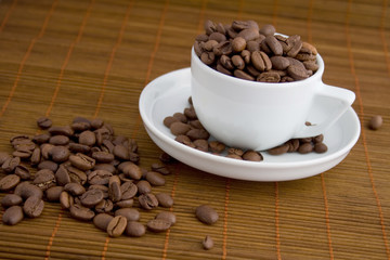 Coffee beans in a cup