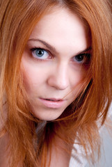 Naklejka premium portrait of beatiful girl with red hair