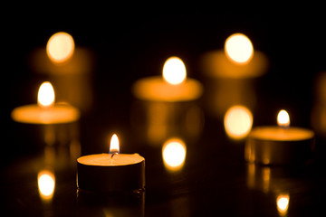 Small Candles Flickering with Shallow DOF
